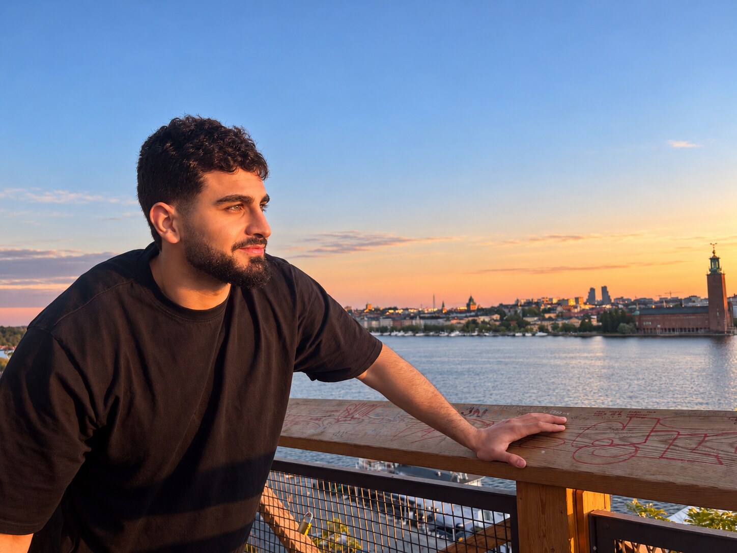 Mustafa Qassmieh overlooking Stockholm at sunset